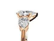 3 Stone Engagement Ring Setting for Pear-Shaped Center with Large Pear-Shaped Accents and Prong Head in Rose Gold
