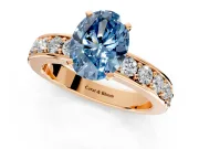 Solitaire Engagement Ring Setting for Fancy Blue Oval Center with Channel-Set Accents and Prong Head in Rose Gold