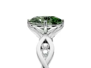 Solitaire Engagement Ring Setting for Fancy Green Oval Center with Accented Twist Band and Leaf Prong Head in Platinum