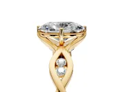 Solitaire Engagement Ring Setting for Oval Center with Accented Twist Band and Leaf Prong Head in Yellow Gold