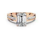 Solitaire Engagement Ring Setting for Emerald Cut Center with Princess Cut Channel Band and Prong Head in Rose Gold