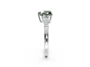 3 Stone Engagement Ring Setting for Fancy Green Heart-Shaped Center with Baguette Accents and Prong Head in White Gold