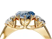 3 Stone Engagement Ring Setting for Fancy Blue Heart-Shaped Center with Raised Basket Heads and Prong Head in Yellow Gold