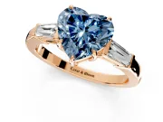 3 Stone Engagement Ring Setting for Fancy Blue Heart-Shaped Center with Baguette Accents and Prong Head in Rose Gold