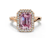 Halo Engagement Ring Setting for Fancy Pink Emerald Cut Center with Twist Band and Prong Head in Rose Gold