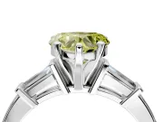 3 Stone Engagement Ring Setting for Fancy Yellow Heart-Shaped Center with Channel Baguette Accents and Prong Head in White Gold