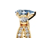 3 Stone Engagement Ring Setting for Fancy Blue Pear-Shaped Center with Pave Twist Band and Prong Head in Yellow Gold