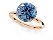 Low-Set Solitaire Engagement Ring Setting for Fancy Blue Round Cut Center with Thin Plain Band and Prong Head in Rose Gold