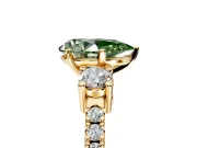 3 Stone Engagement Ring Setting for Fancy Green Pear-Shaped Center with Round Cut Side Accents and Prong Head in Yellow Gold