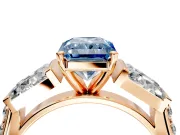 Channel-Set Engagement Ring Setting for Fancy Blue Radiant Cut Center with Baguette Band and Prong Head in Rose Gold