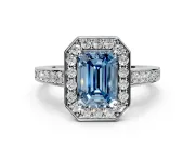 Bezel-Framed Halo Engagement Ring Setting for Fancy Blue Emerald Cut Center with Pave Band and Prong Head in Platinum