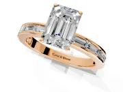 Solitaire Engagement Ring Setting for Emerald Cut Center with Channel Baguette Band and Prong Head in Rose Gold