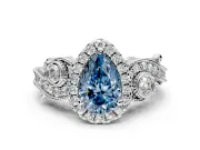 Milgrain Halo Engagement Ring Setting for Fancy Blue Pear-Shaped Center with Shoulder Bezels and Prong Head in White Gold