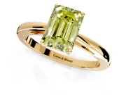Solitaire Engagement Ring Setting for Fancy Yellow Emerald Cut Center with Open Cathedral Shoulders and Prong Head in Yellow Gold