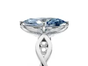 Solitaire Engagement Ring Setting for Fancy Blue Marquise Center with Accented Twist Band and Leaf Prong Head in Platinum
