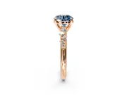 Solitaire Engagement Ring Setting for Fancy Blue Round Cut Center with Trailing Leaf Accent Band and Prong Head in Rose Gold