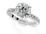Solitaire Engagement Ring Setting for Round Cut Center with Single Row Accent Band and Prong Head in Platinum