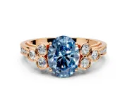Cluster Engagement Ring Setting for Fancy Blue Oval Center with Bezel Accent Clusters and Prong Head in Rose Gold