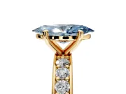 Solitaire Engagement Ring Setting for Fancy Blue Marquise Center with Channel-Set Accents and Prong Head in Yellow Gold
