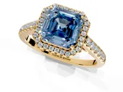 Halo Engagement Ring Setting for Fancy Blue Asscher Cut Center with Narrowing Pave Band and Prong Head in Yellow Gold