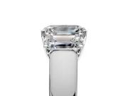 3 Stone Engagement Ring Setting for Emerald Cut Center with Raised Basket Heads and Prong Head in Platinum