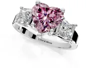 3 Stone Engagement Ring Setting for Fancy Pink Heart-Shaped Center with Matching Side Accents and Prong Head in Platinum