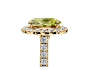 Halo Engagement Ring Setting for Fancy Yellow Oval Center with Narrowing Pave Band and Prong Head in Yellow Gold