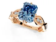 Solitaire Engagement Ring Setting for Fancy Blue Radiant Cut Center with Accented Twist Band and Leaf Prong Head in Rose Gold