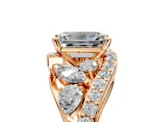 Halo Engagement Ring Setting for Emerald Cut Center with Marquise and Pave Bypass Band and Prong Head in Rose Gold