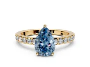 Solitaire Engagement Ring Setting for Fancy Blue Pear-Shaped Center with Round Cut Pave Band and Prong Head in Yellow Gold