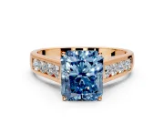 Solitaire Engagement Ring Setting for Fancy Blue Radiant Cut Center with Round Cut Channel Band and Prong Head in Rose Gold