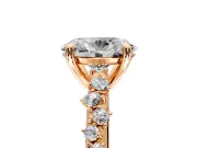 Solitaire Engagement Ring Setting for Oval Center with Trailing Leaf Accent Band and Prong Head in Rose Gold