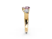 3 Stone Engagement Ring Setting for Fancy Pink Heart-Shaped Center with Raised Basket Heads and Prong Head in Yellow Gold