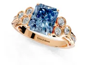 Cluster Engagement Ring Setting for Fancy Blue Radiant Cut Center with Bezel Accent Clusters and Prong Head in Rose Gold