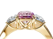 3 Stone Engagement Ring Setting for Fancy Pink Radiant Cut Center with Raised Basket Heads and Prong Head in Yellow Gold