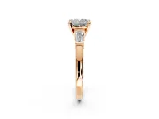 3 Stone Engagement Ring Setting for Cushion Cut Center with Channel Baguette Accents and Prong Head in Rose Gold