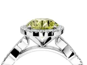 Halo Engagement Ring Setting for Fancy Yellow Round Cut Center with Pave and Plain Twist Band and Prong Head in Platinum