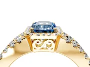 Halo Engagement Ring Setting for Fancy Blue Emerald Cut Center with Wide-Open Pave Split Shank and Prong Head in Yellow Gold