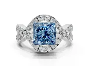 Halo Engagement Ring Setting for Fancy Blue Princess Cut Center with Pave Infinity Twist Band and Prong Head in White Gold