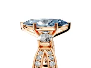 3 Stone Engagement Ring Setting for Fancy Blue Marquise Center with Pave Twist Band and Prong Head in Rose Gold