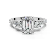 3 Stone Engagement Ring Setting for Emerald Cut Center with Round Cut Side Accents and Prong Head in Platinum