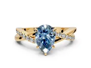 Crossover Engagement Ring Setting for Fancy Blue Pear-Shaped Center with Pave and Plain Strands and Prong Head in Yellow Gold