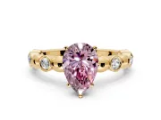 Solitaire Engagement Ring Setting for Fancy Pink Pear-Shaped Center with Beaded Bezel Station Band and Prong Head in Yellow Gold