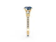 3 Stone Engagement Ring Setting for Fancy Blue Round Cut Center with Round Cut Side Accents and Prong Head in Yellow Gold