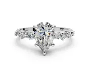 Solitaire Engagement Ring Setting for Pear-Shaped Center with Trailing Leaf Accent Band and Prong Head in Sterling Silver
