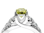Solitaire Engagement Ring Setting for Fancy Yellow Emerald Cut Center with Graduated Shared Prongs and Prong Head in Platinum