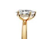Hidden Halo Engagement Ring Setting for Pear-Shaped Center with Thin Rounded Band and Prong Head in Yellow Gold