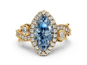 Milgrain Halo Engagement Ring Setting for Fancy Blue Marquise Center with Shoulder Bezels and Prong Head in Yellow Gold