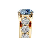 Solitaire Engagement Ring Setting for Fancy Blue Round Cut Center with Graduated Shared Prongs and Prong Head in Yellow Gold