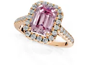 Halo Engagement Ring Setting for Fancy Pink Emerald Cut Center with Narrowing Pave Band and Prong Head in Rose Gold